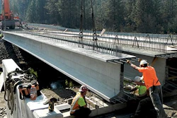 136.8-ft.-long prestressed concrete super girders for the new Miles Creston Bridge in Lincoln County, Wash., are 58 in. tall with 49-in.-wide top flanges to maximize span length, minimize the number of girders and allow clearance above the river for a 100-year flood.