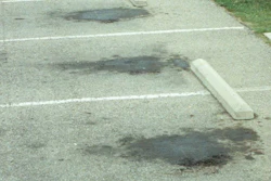 If the asphalt has not been sealed, the oil will start to dissolve the asphalt binder in the pavement leading to pitting. When pitting occurs, the problem is compounded by allowing water to wash other oil and chemicals into the pitted area, further deteriorating the pavement.