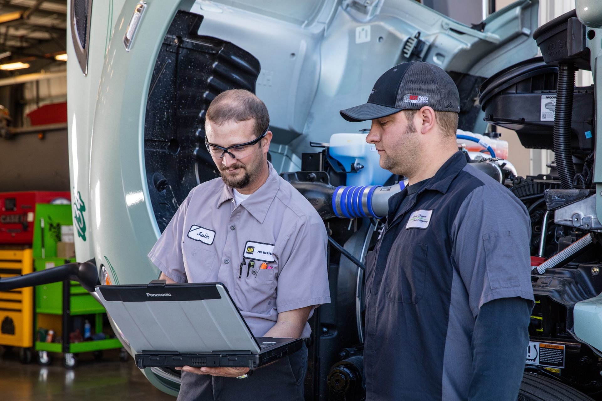 Central Oregon Truck Co. has realized the benefits of Kenworth TruckTech+. Justin MacDonald (left), a service technician with Papé Kenworth, is shown with Travis Seeger, Central Oregon Truck’s maintenance shop foreman, in front of one of the company’s T680s.