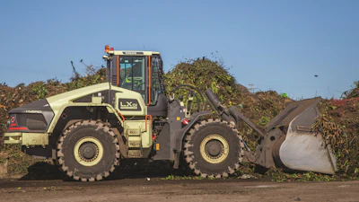 Individual wheel motors eliminate the Volvo LX1 hybrid loader's mechanical drive line -- drop box, drive shafts, differentials and axles. Designers took advantage of the structural change to move the loader arms closer to the tractor's center of gravity. The result is that a Volvo L120-sized machine works with an L150-sized bucket.