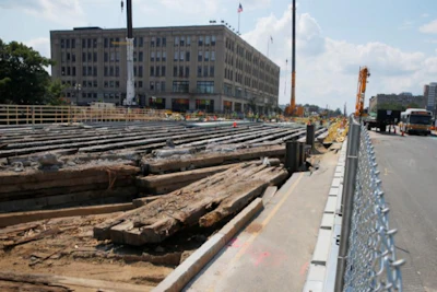 Work crews work to replace a bridge over the Massachusetts Turnpike, part of in MassDOT's (Massachusetts Department of Transportation) Commonwealth Avenue Bridge Replacement Project, in Boston, Massachusetts, U.S., August 4, 2017.