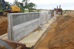 A concrete flood wall is being constructed to help reduce flooding as part of the Port Monmouth Flood Risk Management Project in Port Monmouth, New Jersey.