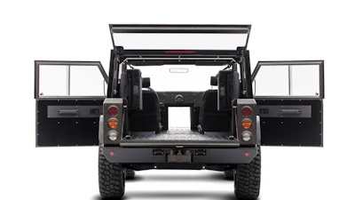 Pass-through door can accommodate up to 24 2x4s.