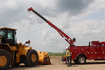 When preparing for a lift, be aware of ground conditions and ensure the truck is on solid footing, not a newly excavated piece of ground that is soft. Cribbing or an outrigger pad can be used to provide additional support, if needed.