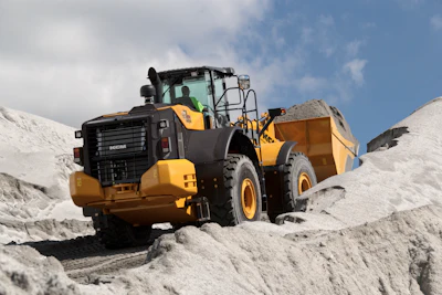 Kawasaki built special logic into the powertrain that avoids upshifting as the operator approaches a truck, or that allows the operator to use both boom and bucket functions simultaneously while digging to improve control and performance.