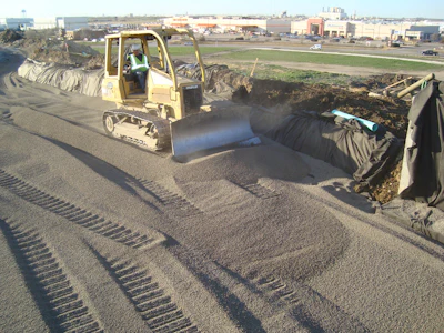 Once the fill materials were in place, they were covered with a crushed limestone base subgrade, hot mix asphalt and topped with a 10-in. concrete paved road.