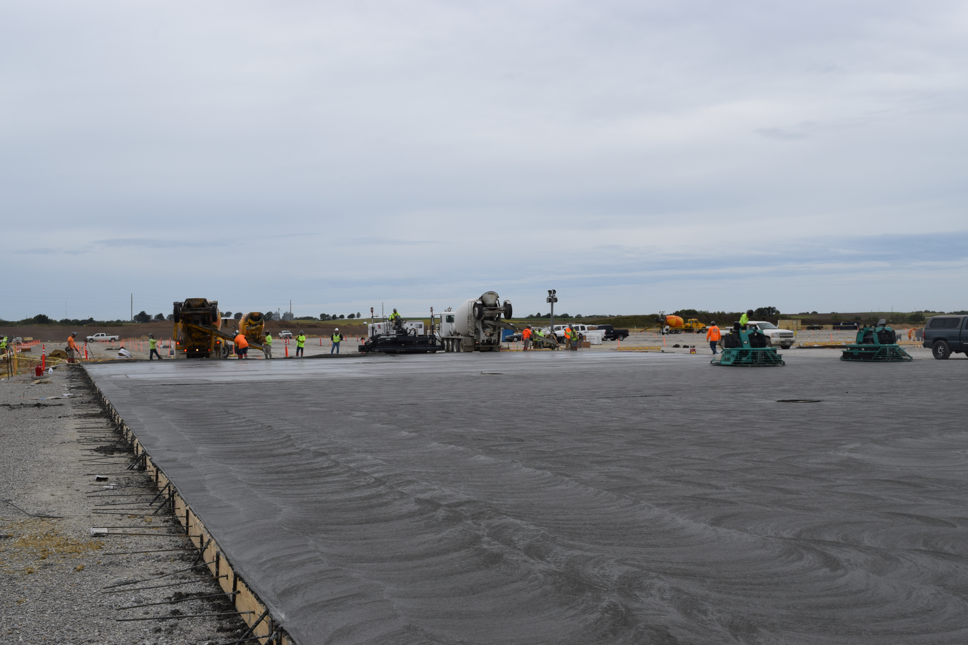 Figure 1: Large slab on grade placement utilizing truck dump and laser screed strike-off.