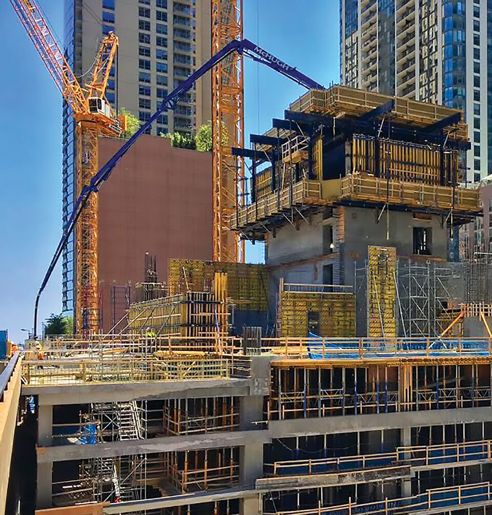 Putzmeister concrete pumping equipment stands tall as the Vista Tower ascends in downtown Chicago.
