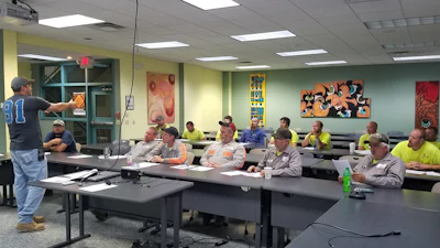 A Schlouch Inc. team meeting. “Leadership must be very open and honest when it comes to safety,” says Don Swasing. “As we’ve transformed our culture, it has been important to celebrate good results. At the same time, when you have a near miss, you have to immediately let everyone know.”