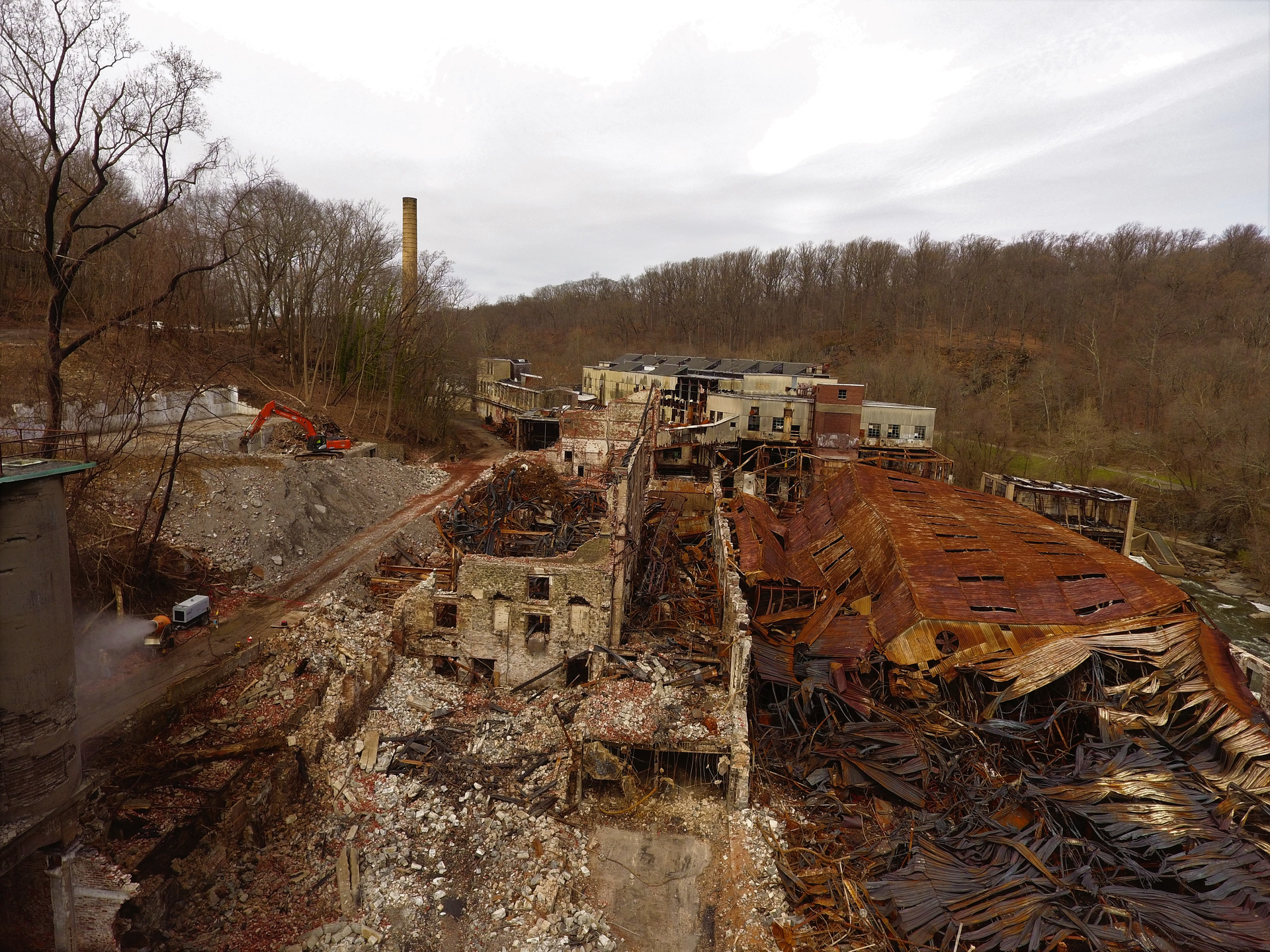 Neuber Demolition & Environmental Services had to set up differently for its demolition project because it had to be cautious to prevent any of the damaged structure from falling into the river below.