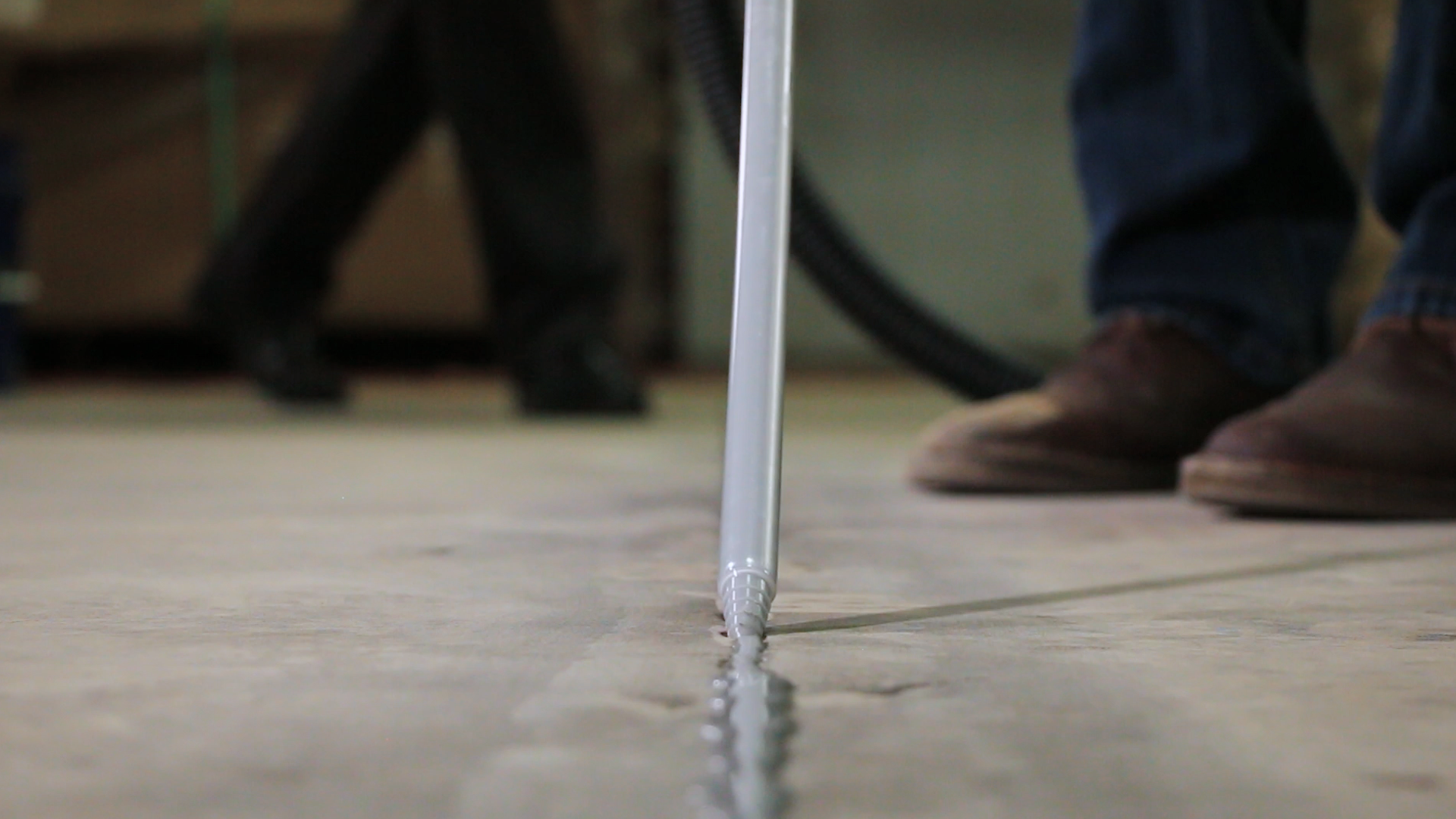 Today's joint fillers are intentionally over-applied in warehouse and industrial applications, and flush-trimmed with a floor razor to keep out debris and protect slab edges from spalling.