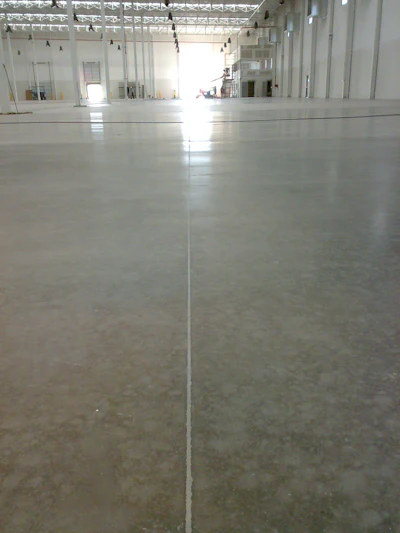 After the application pictured here is what a control joint on warehouse floor should look like.