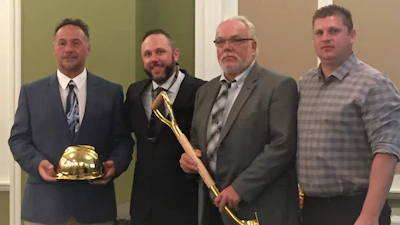 At the NUCA PA award ceremondy (from left) Steve Funk, General Superintendent, Schlouch Inc.; Chuck Fehlinger, NUCA PA President; Don Swasing, Chief Operating Officer, Schlouch Inc.; and William Kukurin, NUCA PA Vice-President.