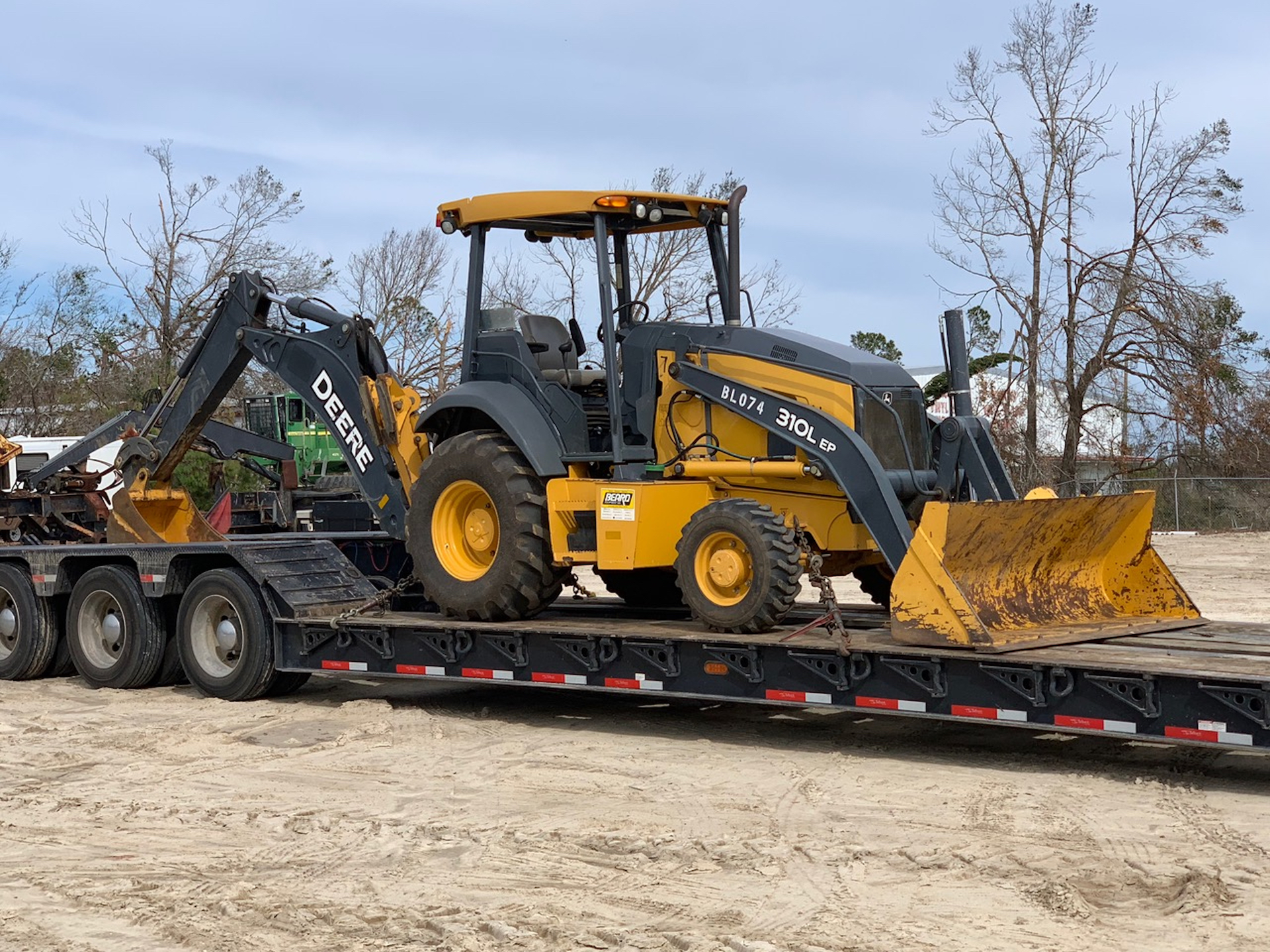 Lynn Haven, Callaway and Mexico Beach received a 310L backhoe and Jackson County received a 310SL free of charge for six months.