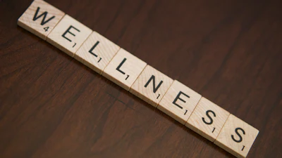 Wellness aims at preventing illness and injury and prolonging a healthy life as opposed to treating after the fact.