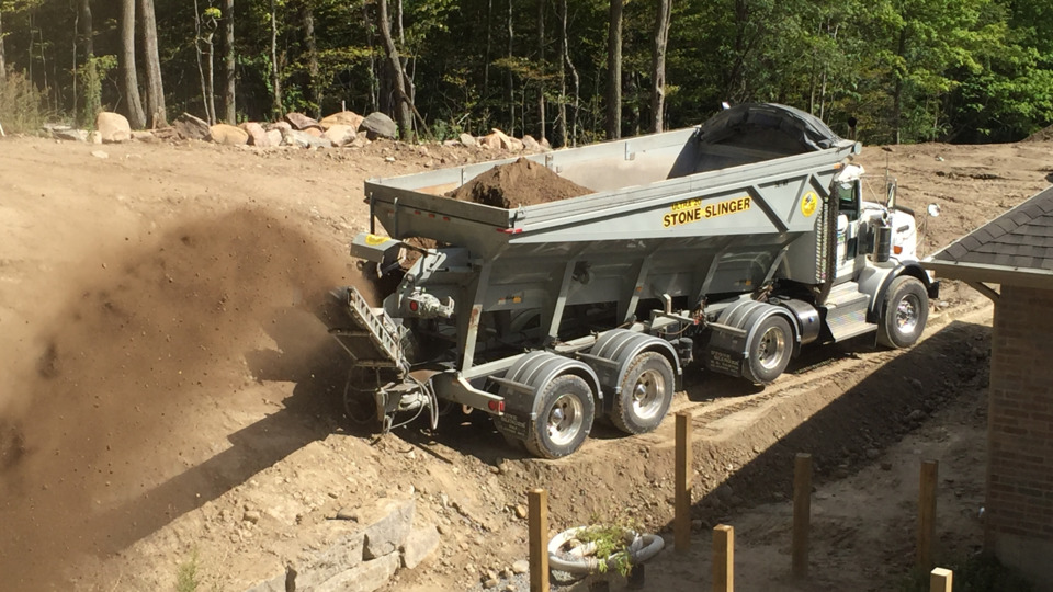Gravel Conveyors Inc. is a Stone Slinger dealer, and the company operates a fleet of 12 trucks similar to this one fixed with the conveyors.