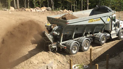Gravel Conveyors Inc. is a Stone Slinger dealer, and the company operates a fleet of 12 trucks similar to this one fixed with the conveyors.
