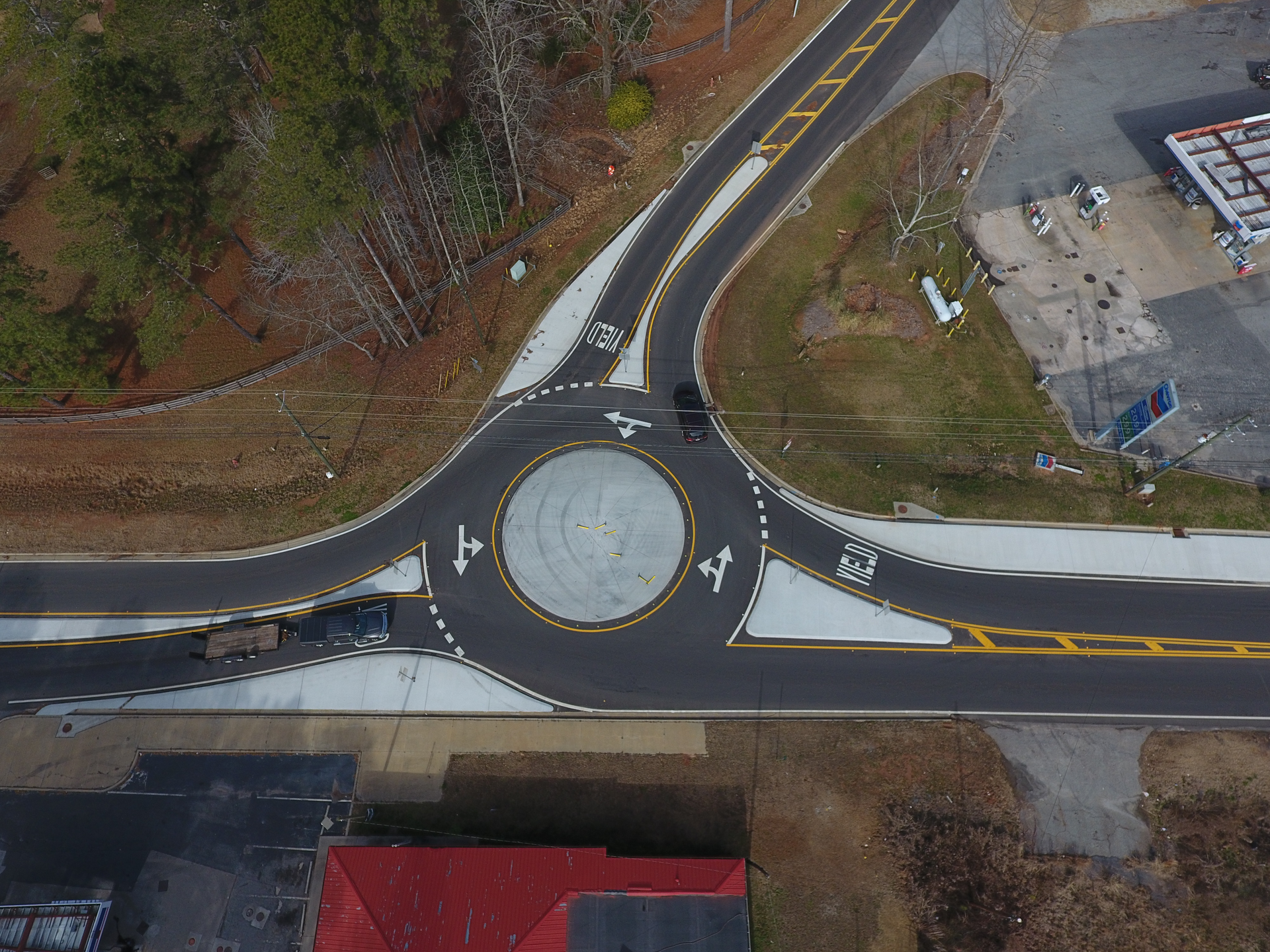 Piedmont Paving waited a state-mandated 14-day period following paving before installing thermoplastic markings. Once the thermoplastic is down they returned and addressed the shoulders and finished any grassing and grading work.