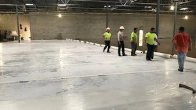 Installing wet cure blankets.