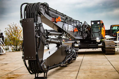 Two-piece booms offer an advantage when you need to work close in to the machine. Image source: Volvo CE