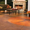 Pictured, an outdoor living space where acid stains were used to etch the concrete surface.