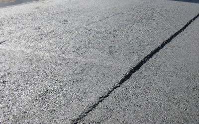 “Uneven wear on screed plates can be an indicator that the crew is not setting up the screed properly before paving,” Jon Anderson with Caterpillar says. “Flatness can be quickly and easily checked in the field by running a stringline across the trailing edge (back edge) of the screed plate. This should be done whenever new screed plates are installed or whenever texture differences that appear as longitudinal stripes appear in the mat.'
