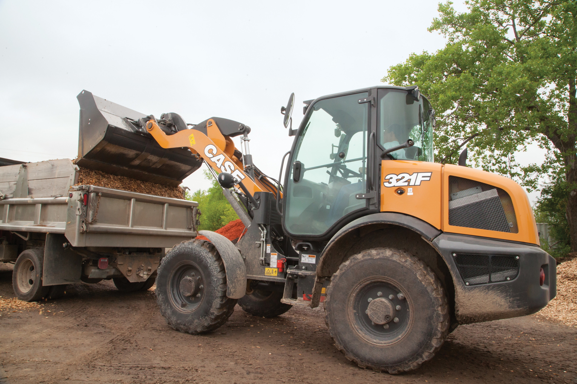 Case compact wheel loaders include new adjustable electrohydraulic controls that allow operators to adjust the responsiveness of the lift and tilt bucket functions.