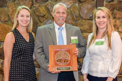 Jim Whitfield, MAPEI Corporation’s Director of Technical Services, and Brittany Storm, MAPEI Corporation’s Sustainabaility Manager, receiving the award.