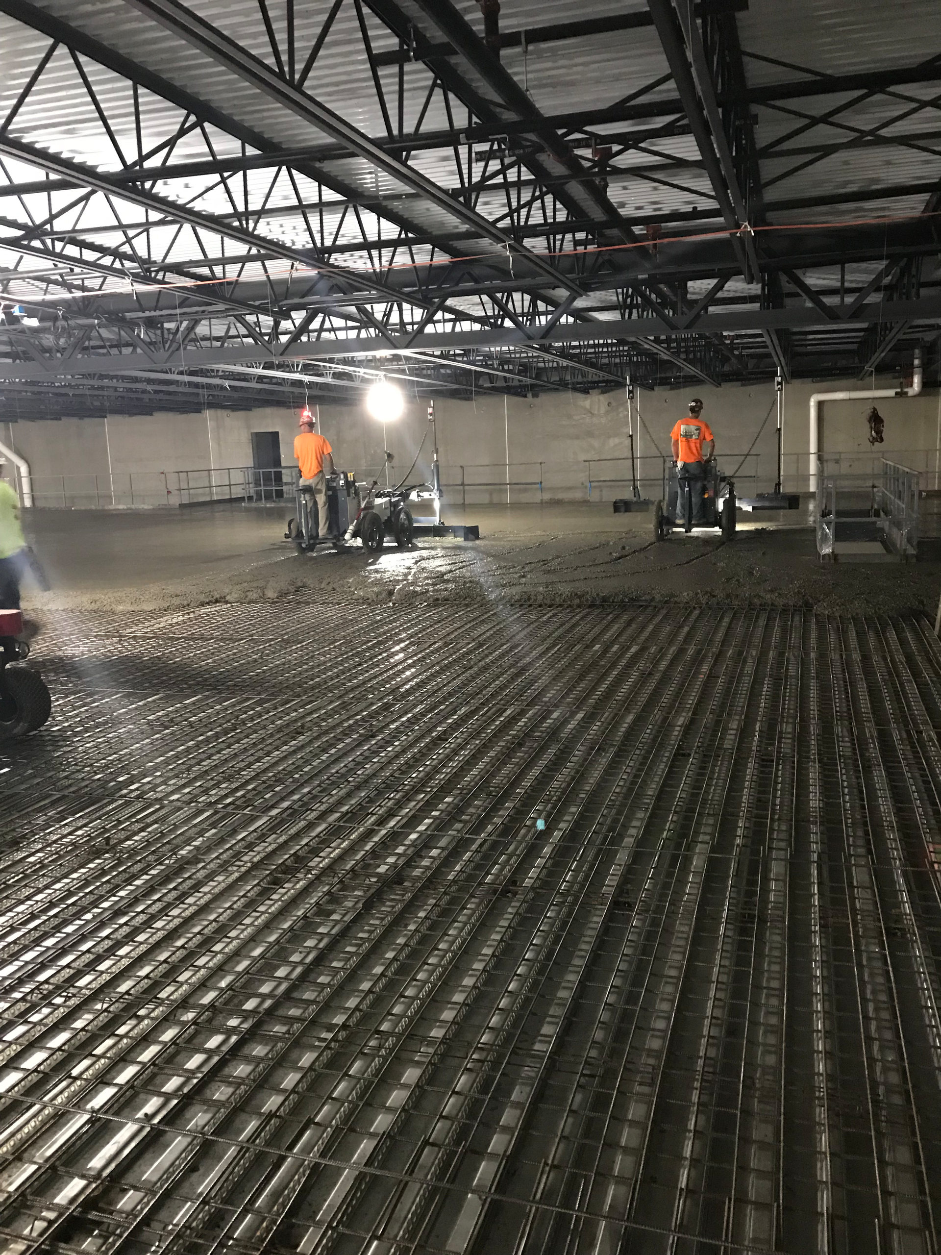 Drive-in laser screeds can be used for controlled elevation raking and strike-off.