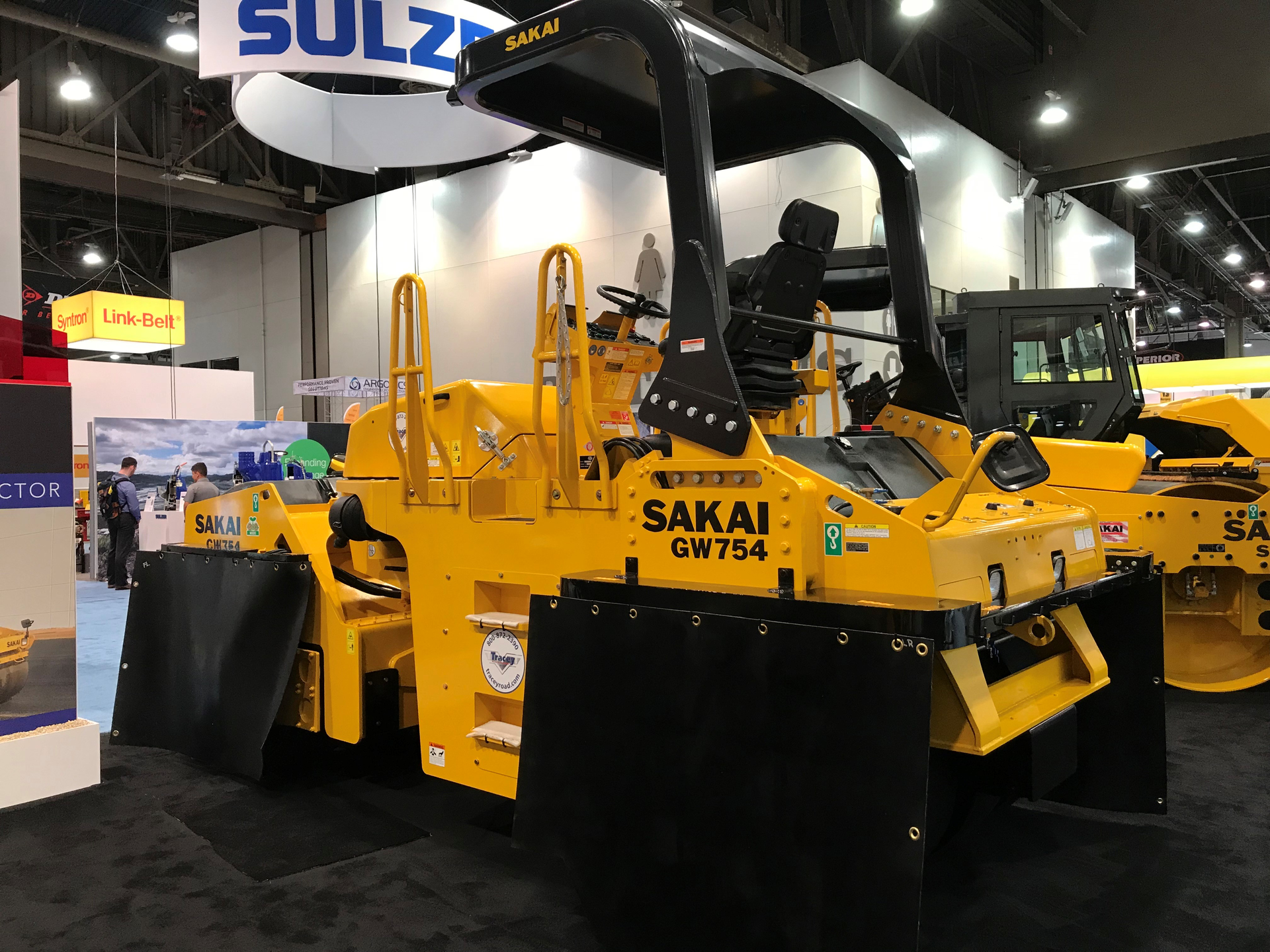 Sakai's GW754 vibratory pneumatic tire roller on the ConExpo floor.