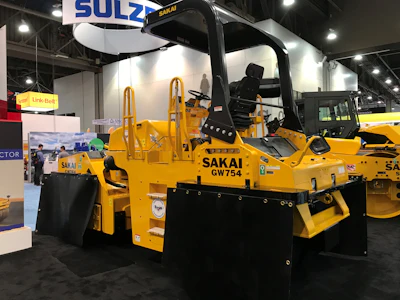 Sakai's GW754 vibratory pneumatic tire roller on the ConExpo floor.