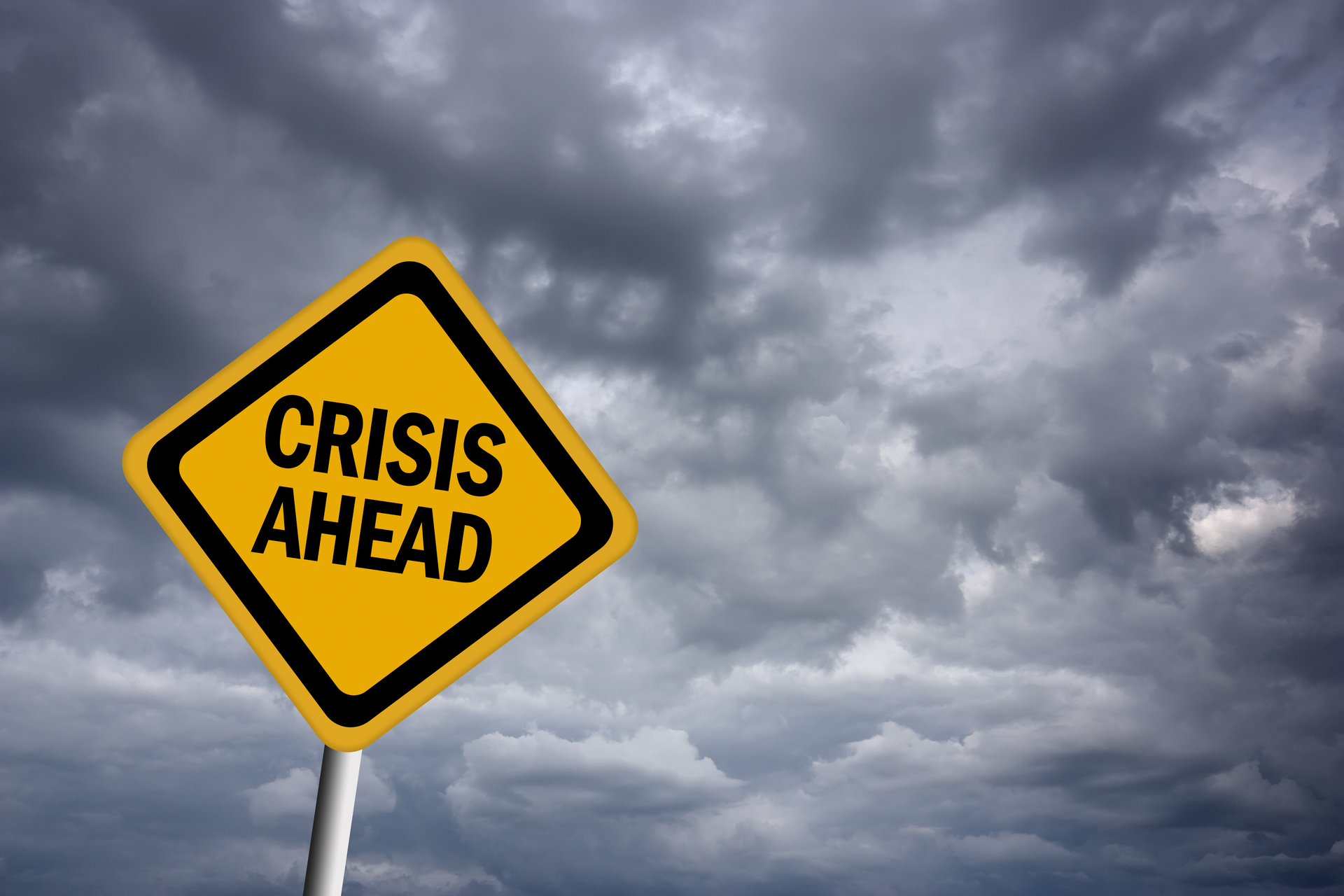 Crisis Ahead Road Sign