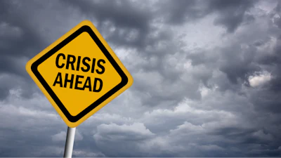 Crisis Ahead Road Sign