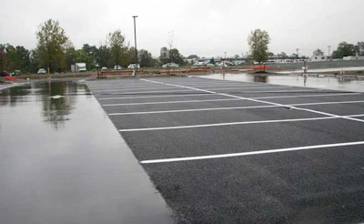 Porous asphalt pavements are commonly used for parking lots and other light-duty applications. Full-depth porous asphalt pavements are increasingly being used on roadways as part of efforts to mitigate flooding hazards, reduce hardscape and improve sustainability.