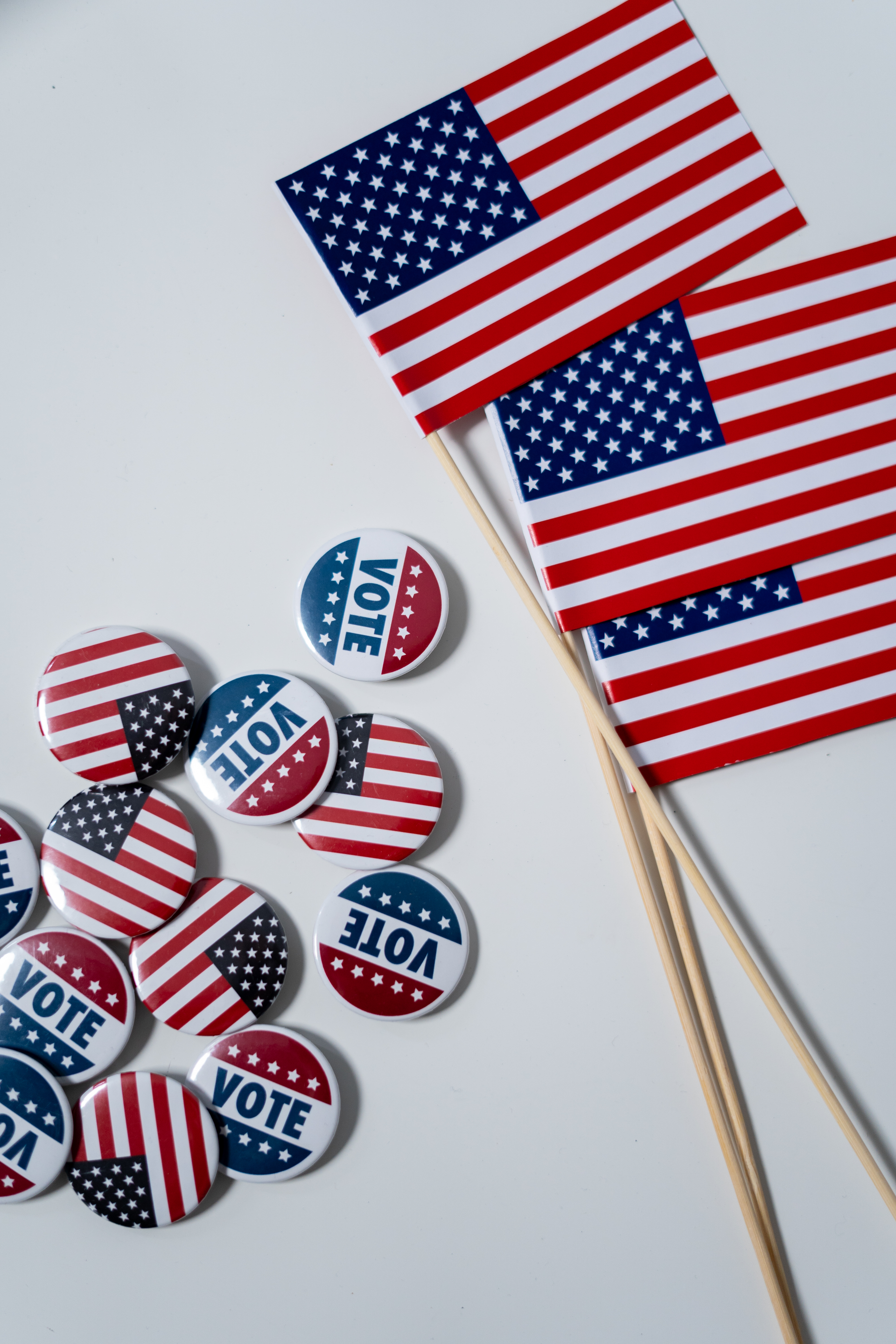 American Flags And Pins On White Background 4669109