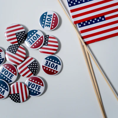 American Flags And Pins On White Background 4669109