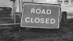 Grayscale Photo Of Road Closed 3907990