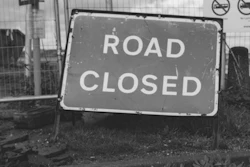 Grayscale Photo Of Road Closed 3907990