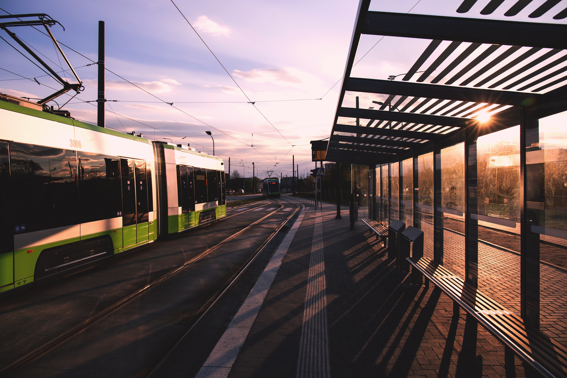 Green And White Train Near Train Terminal During Daytime 90550
