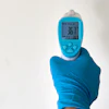 Person Wearing A Rubber Glove 4021186