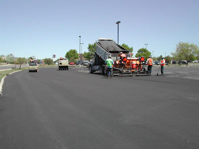 “When the delivery truck is backing up, it’s important the paver operator focus his attention and not lose concentration,” says John Ball, Top Quality Paving. “He should not be looking at other workers or talking with other workers until the truck gets to the paver.”