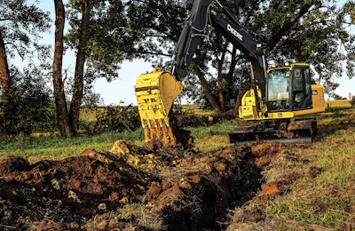 If you have to dig a trench while on a slope, be aware of the boom and arm position. When swinging, bring the boom and arm in fairly close to the machine. When coming out of the hole, bring the mast in toward the machine so the swing torque will allow the machine to swing.