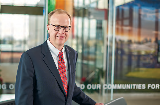 Richard M. Olson, Chairman and CEO