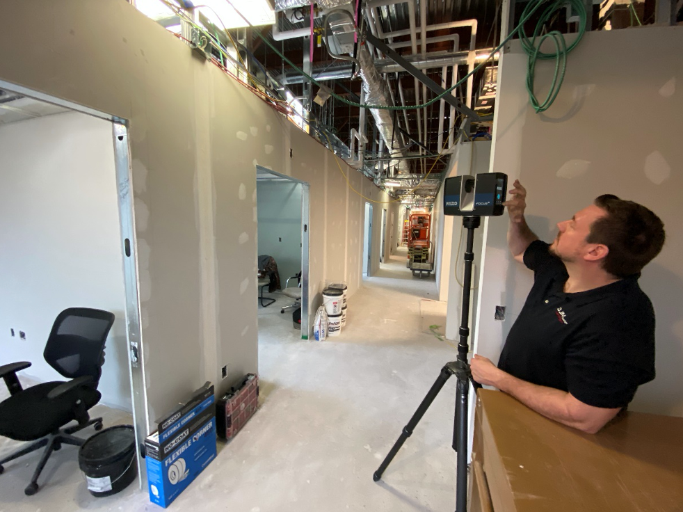 3D scanners spin in a 360-degree radius to analyze every tiny detail of the construction site.