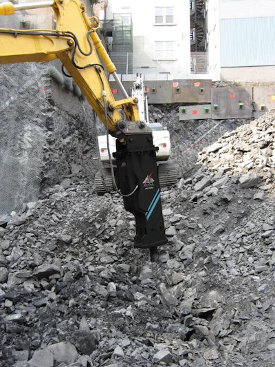 You have steel against steel and a lot of heat so you need a good lubricant, and a lot of it. Manufacturers typically recommend high-moly chisel paste with a working temperature above 500° F.
