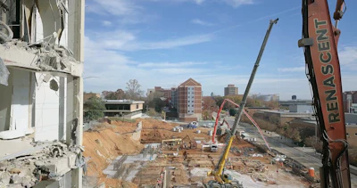 Once strip-out and abatement was complete, Renascent crews demolished the east wing down to the basement.