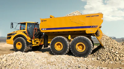When scraper cutting edges encountered boulders hidden below the mine site's surface, they were removed and transported via a Volvo A40G truck fitted with a K-Tec EJB 4X ejector body (such as shown).
