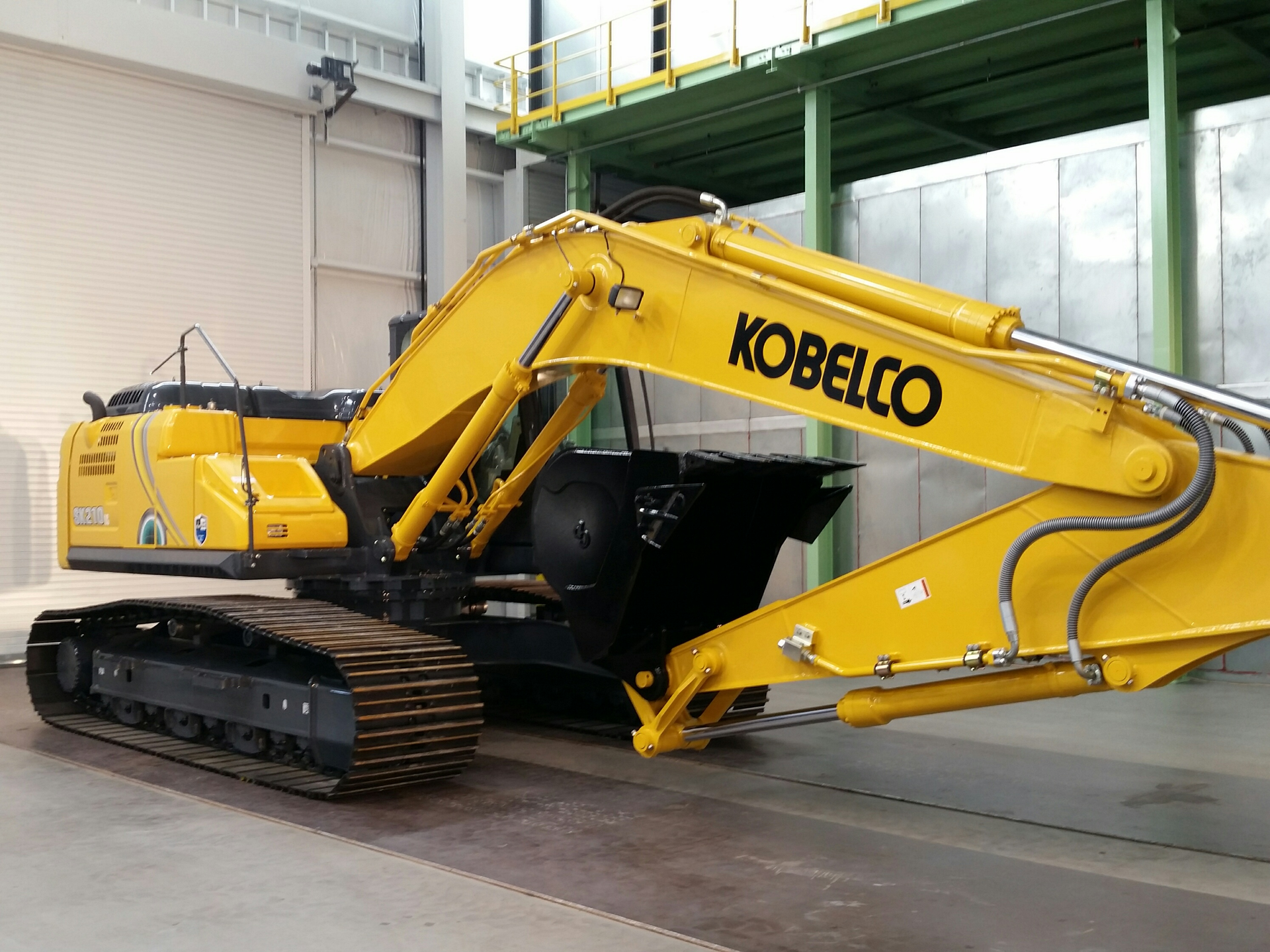 Shown is the first unit to roll off the production floor at the Spartanburg excavator manufacturing facility in 2016.