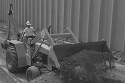 John Deere first started backhoe-loader production with the introduction of the JD310 model in 1971.