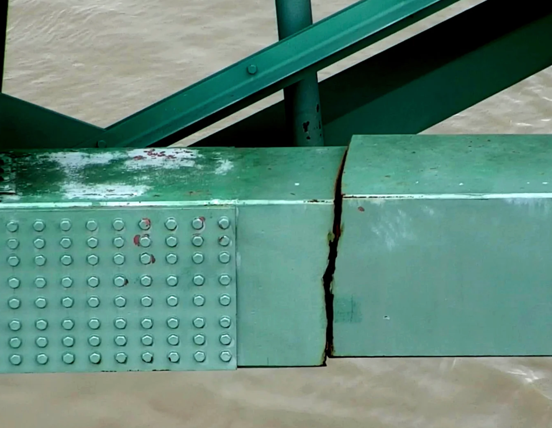 Traffic on the six-lane bridge was shut down May 11 after inspectors found a “significant fracture” in one of two 900-foot horizontal steel beams that are critical for the bridge’s integrity.